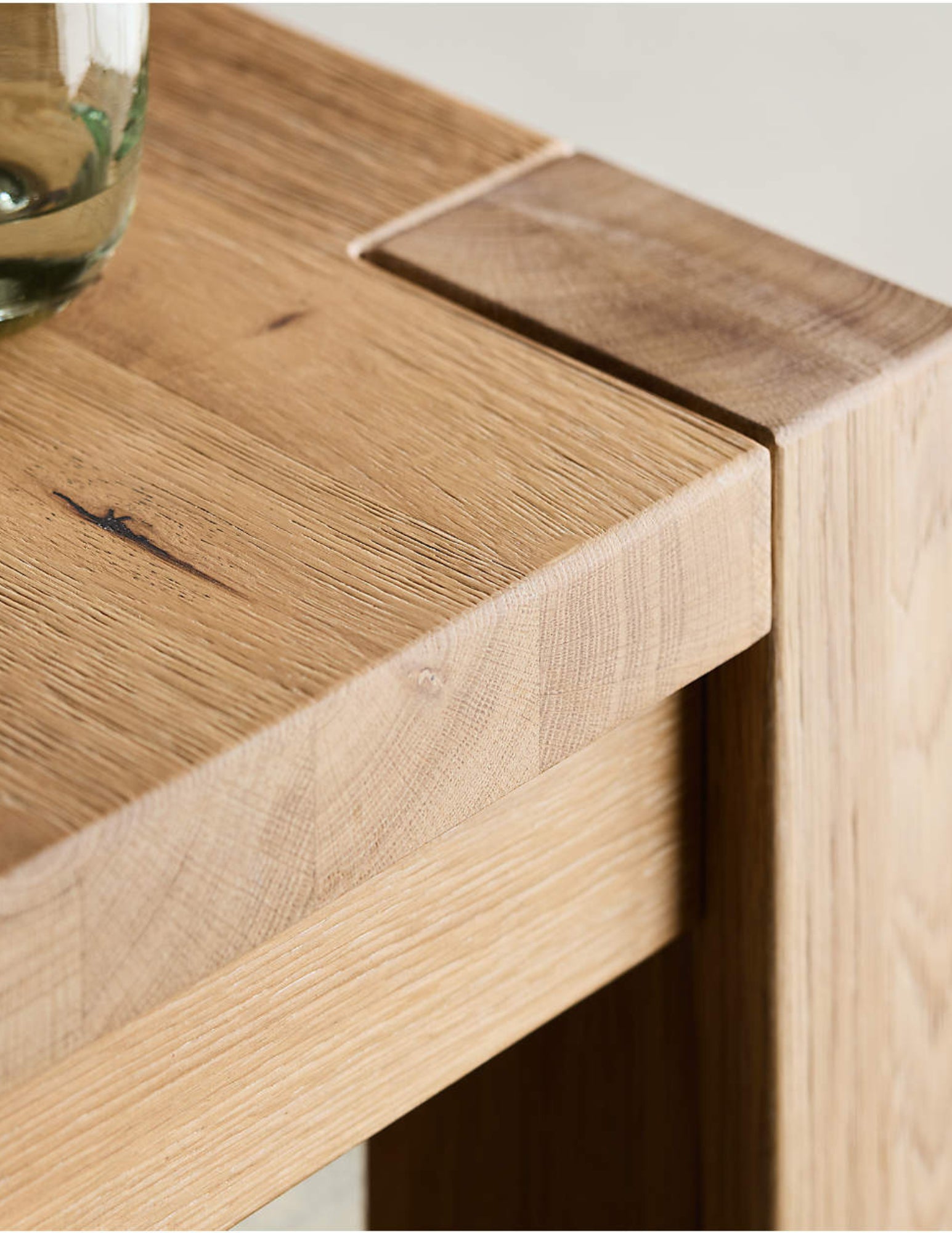 solid white oak dining table natural wood grain detail corner